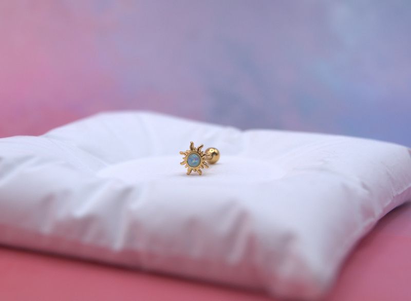 Golden Opal Sun piercing
